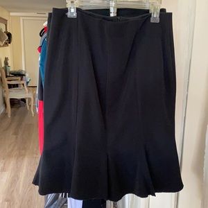 Black skirt with flair bottom.